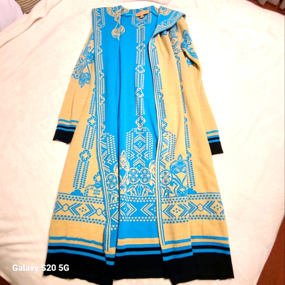 Peachpuff long cardigan,  size Medium  colors turquoise, light tan, black.